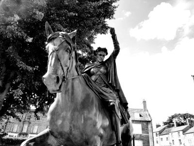 Woman Riding Horse Statue