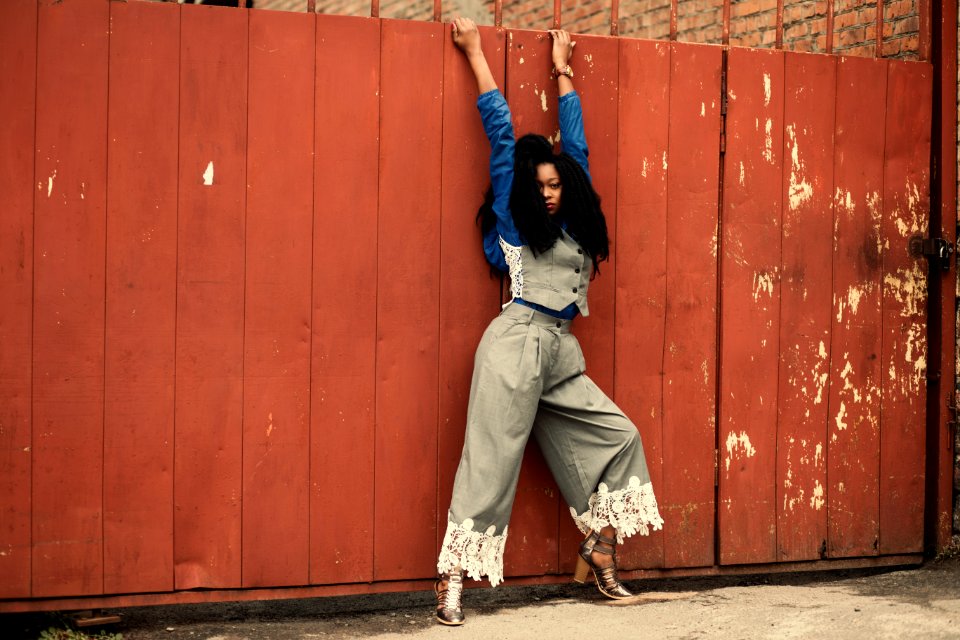 Woman In Gray And Blue Long-sleeved Shirt And Gray Pants