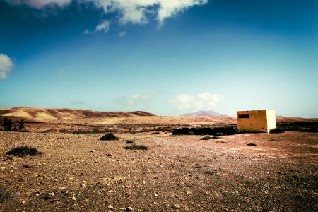 White Concrete Building On Desert photo