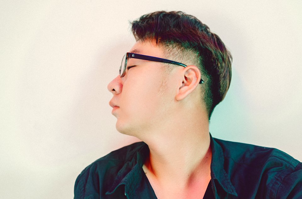 Man In Black Collared Shirt With Black Frame Eyeglasses