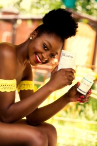 Woman Holding Collagen Box photo