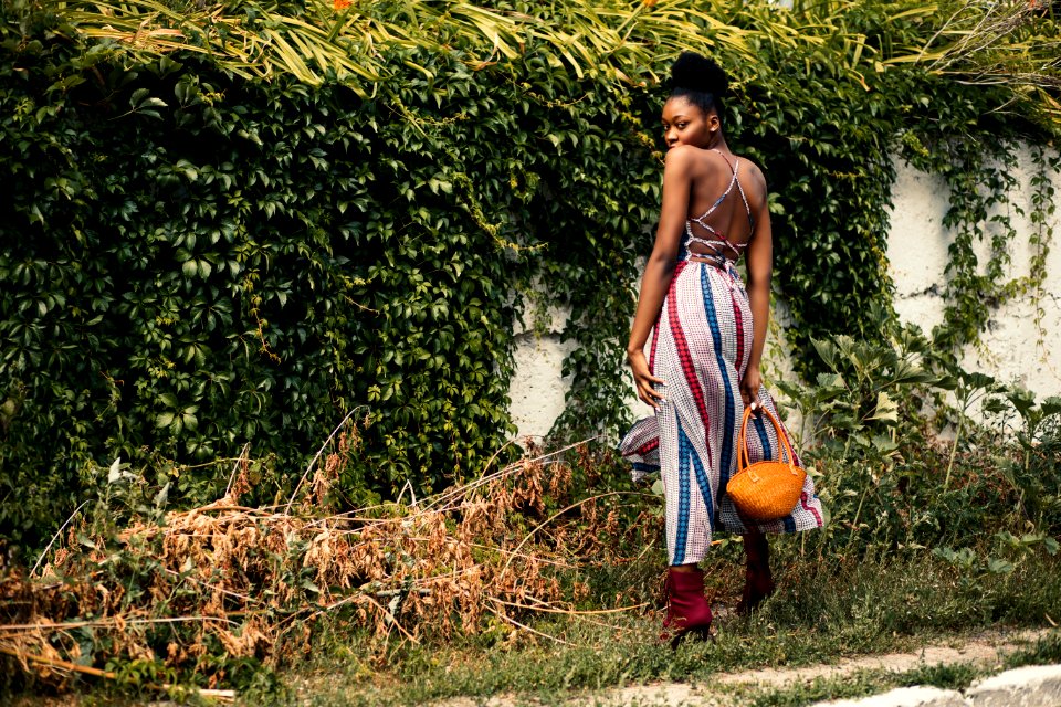 Woman Wearing White And Multicolored Overall Pants