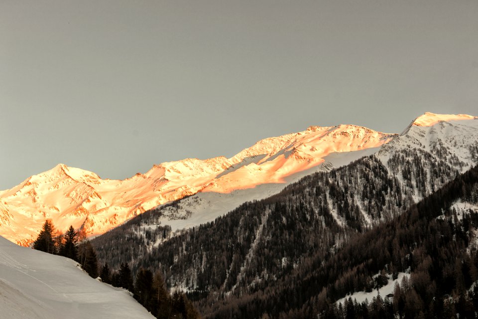 Snow Capped Mountain Shined By The Sun