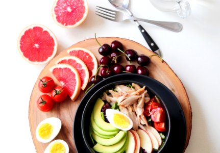 Bowl Of Vegetable Salad And Fruits photo