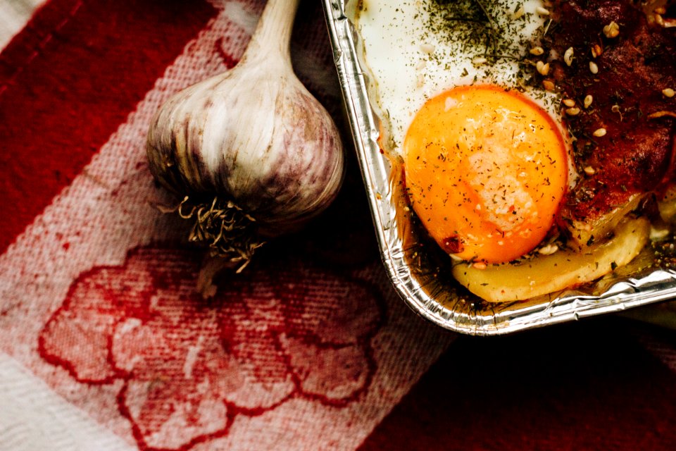 Close-up Photography Of Garlic And Egg Yolk
