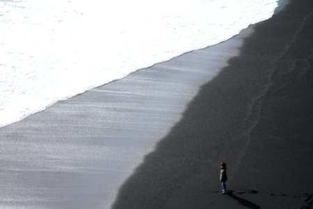 Child Standing On The Seashore photo