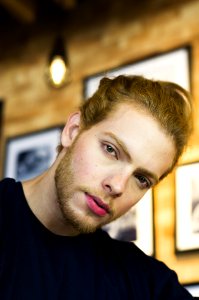 Man In Black Crew-neck Top With Pink Lips photo