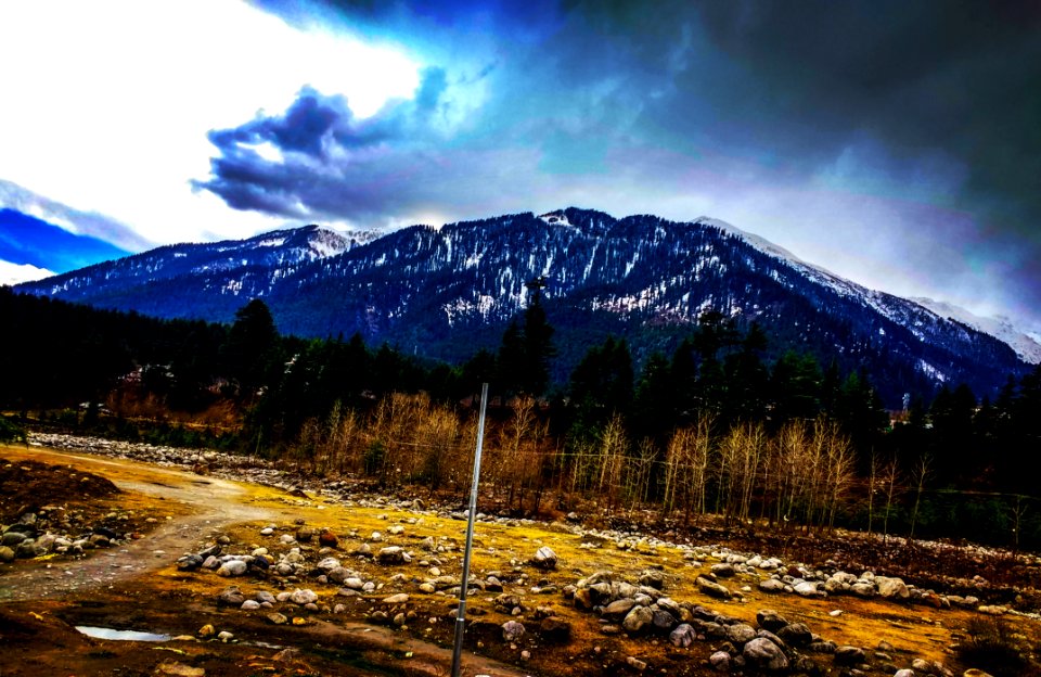 Clouds On Top Of Mountain