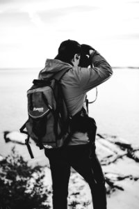Grayscale Photography Of Man Taking Photo photo