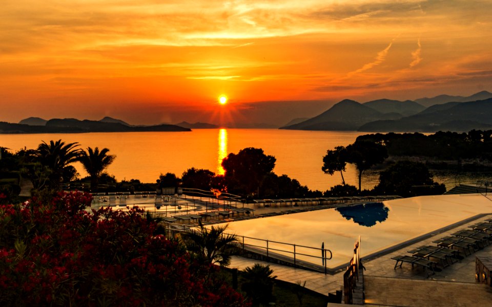 Aerial Photography Of Swimming Pool During Sunset