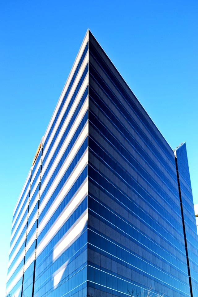 Gray Concrete Building Under Blue Sky photo