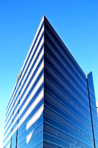 Gray Concrete Building Under Blue Sky photo