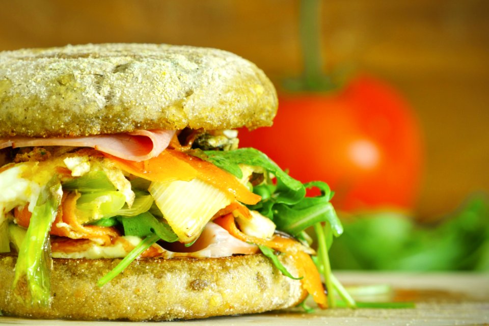 Macro Photography Of Vegetable Filled Hamburger