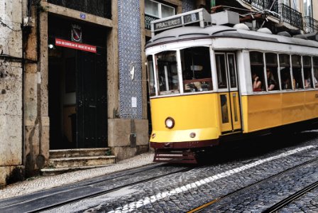 White And Yellow Train With Passenger photo