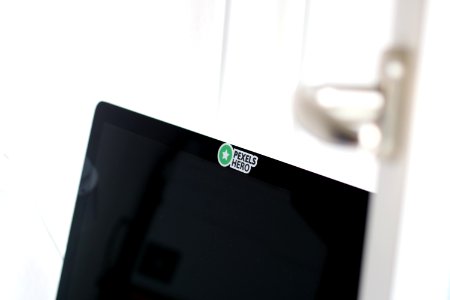 Closeup Photo Of Opened Black Laptop Computer With Pexels Hero Sticker photo