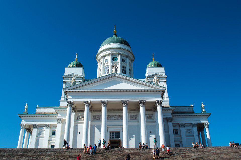 White Concrete Building Under Blue Sky photo