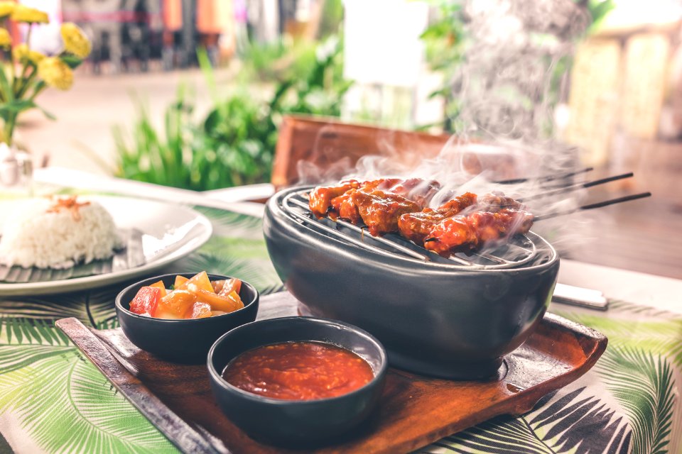 Barbecue On Grill With Sauce Platter