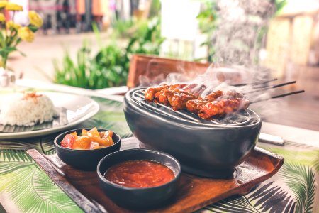 Barbecue On Grill With Sauce Platter