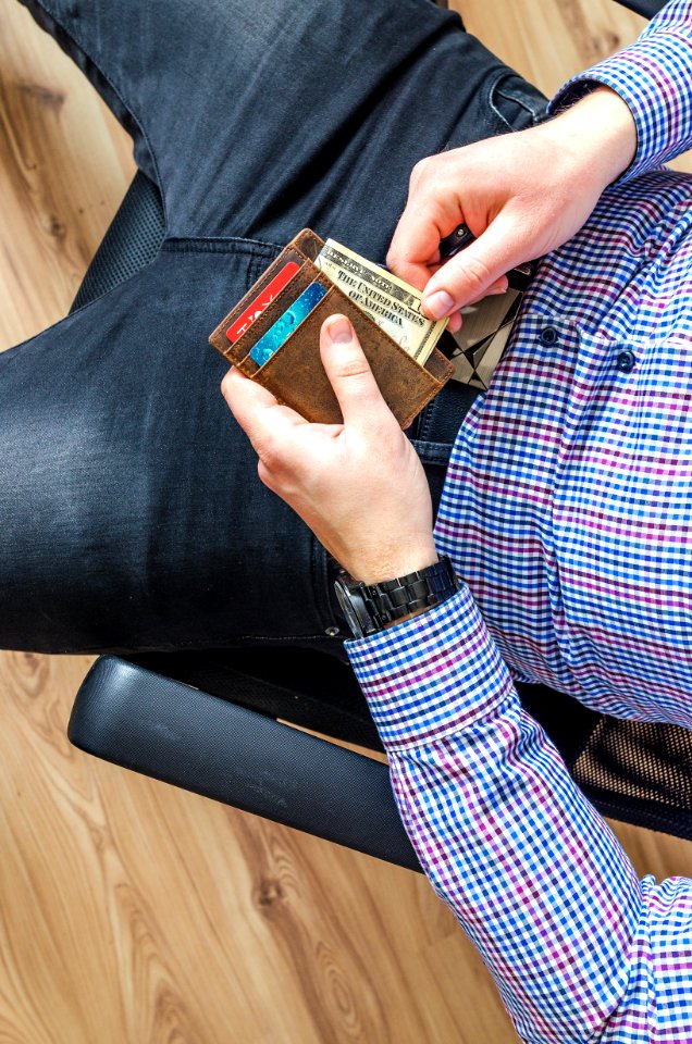 Man Holding Wallet