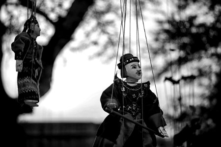 Grayscale Of Two String Puppets