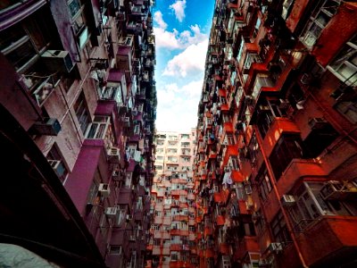 Purple And Red Concrete Buildings And Cloudy Sky photo