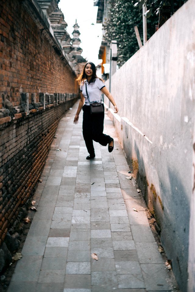 Woman Wearing White Shirt And Black Pants