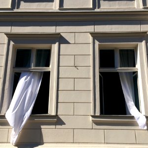 Opened Windows With White Curtains