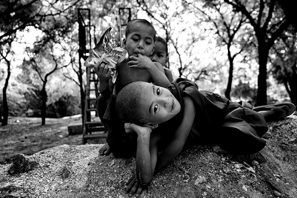 Grayscale Photo Of Three Children Near Trees