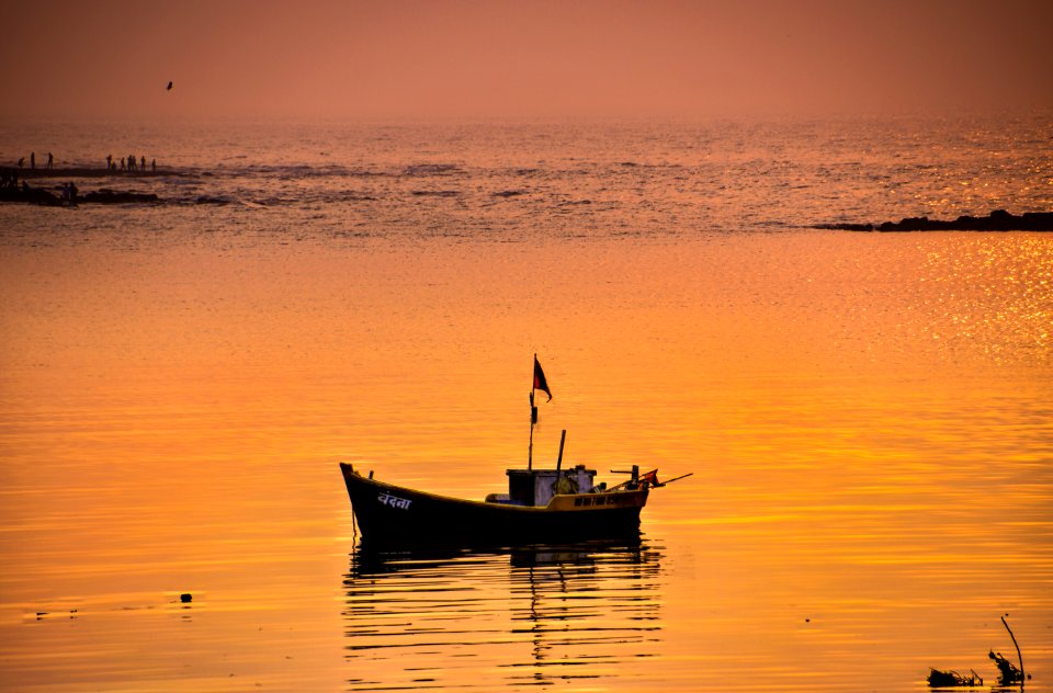 Black Sail Ship On Body Of Water
