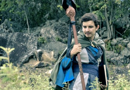 Man Holding Staff