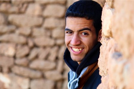 Photo Of Man Behind A Wall photo