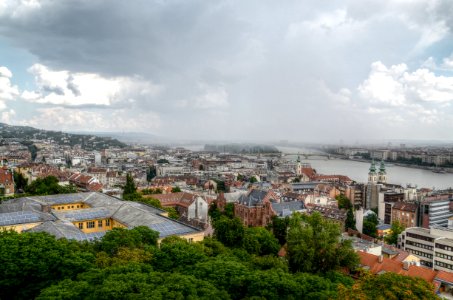 Aerial Photo Of A City Near Body Of Water photo