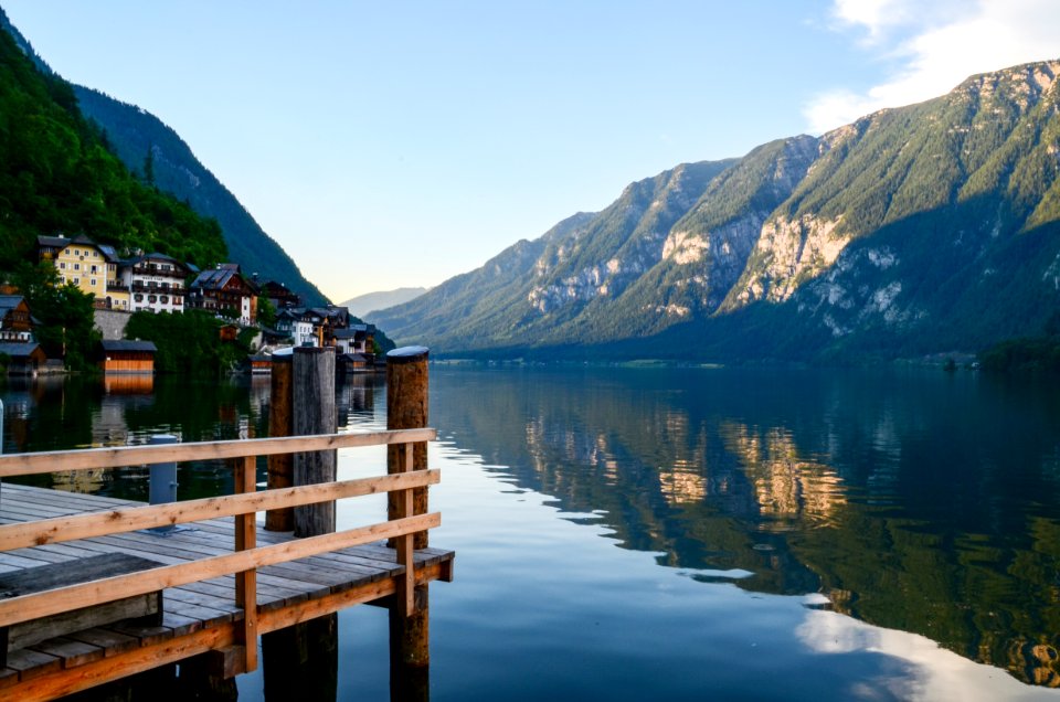 Green Mountain Surrounded By Body Of The Water