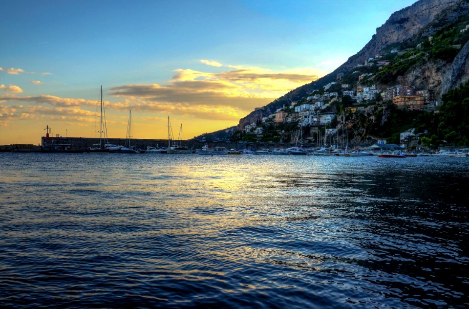 Landscape Of Houses Near The Body Of Water
