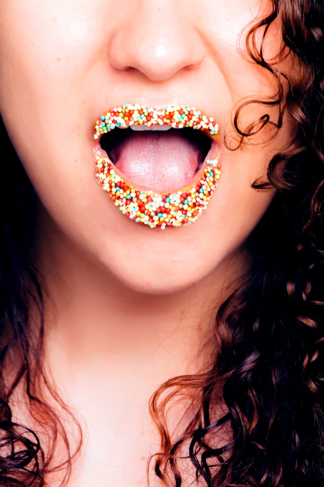 Woman With Sprinkled Multicolored Lipstick