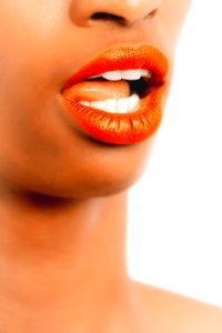Selective Focus Photography Of Woman With Orange Lipstick photo