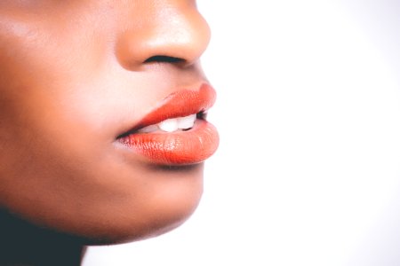 Woman Wearing Orange Lipstick photo