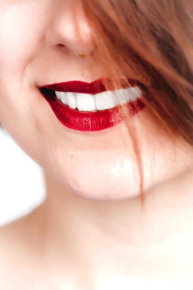 Close Up Photography Of Woman With Red Lips