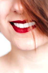 Close Up Photography Of Woman With Red Lips photo