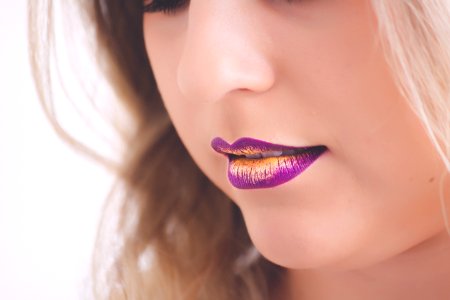 Woman Wearing Pink And Yellow Lipstick photo