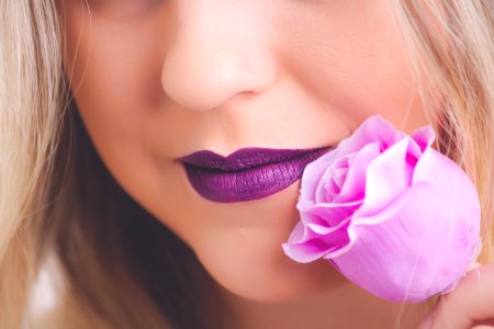 Woman Holding Pink Rose Flower
