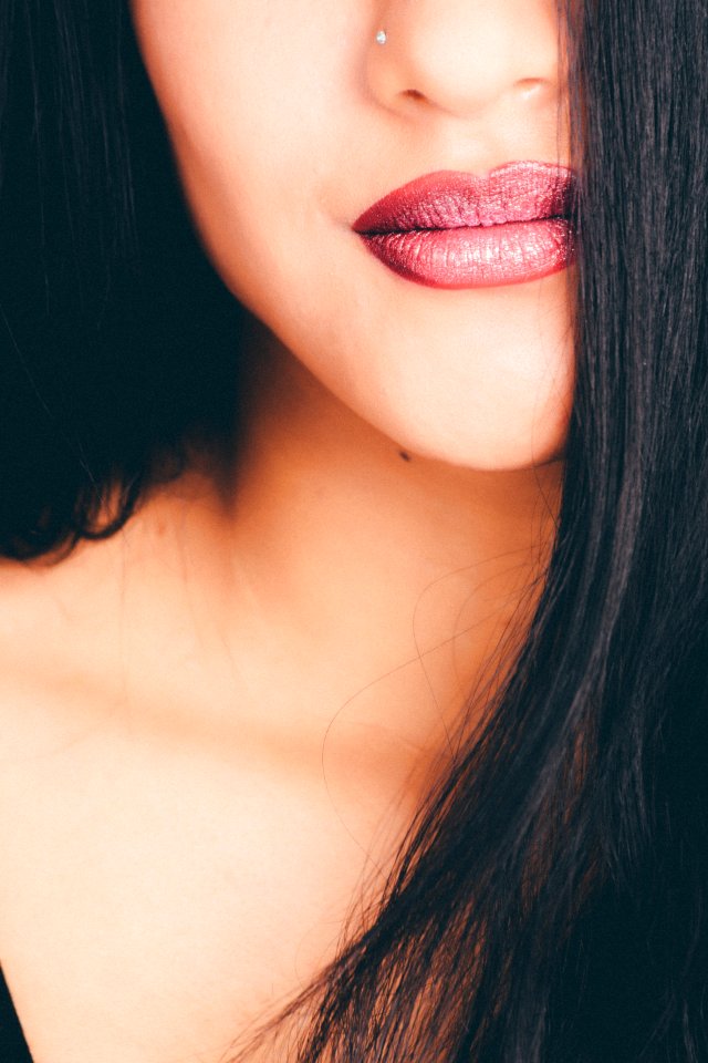 Woman Showing Red Lipstick