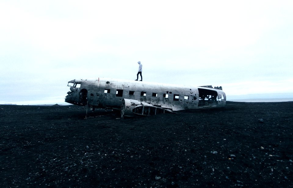 Person Standing On Wrecked Plane