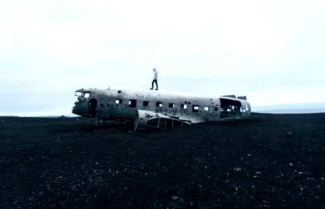 Person Standing On Wrecked Plane
