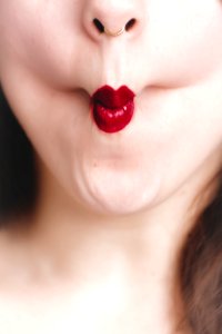Woman Showing Red Lips
