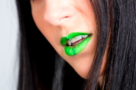 Focus Photography Of Woman Wearing Green Lipstick