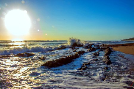 Portrait Photography Of Seashore And Sun