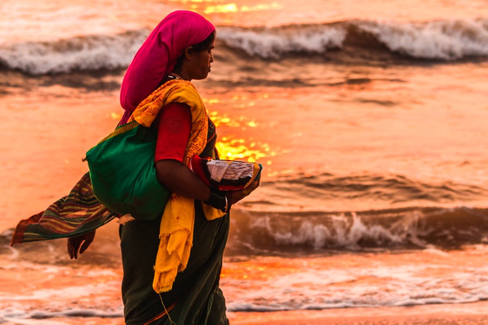 Woman Holding Grey Bowl Near Seaside