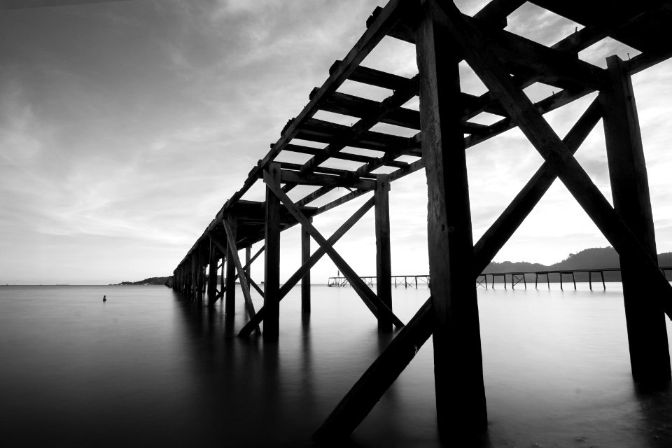Grayscale Photo Of Bridge