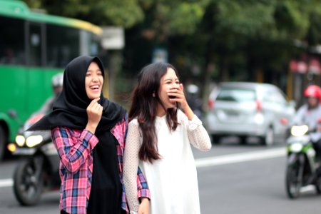 Two Women Laughing At Street